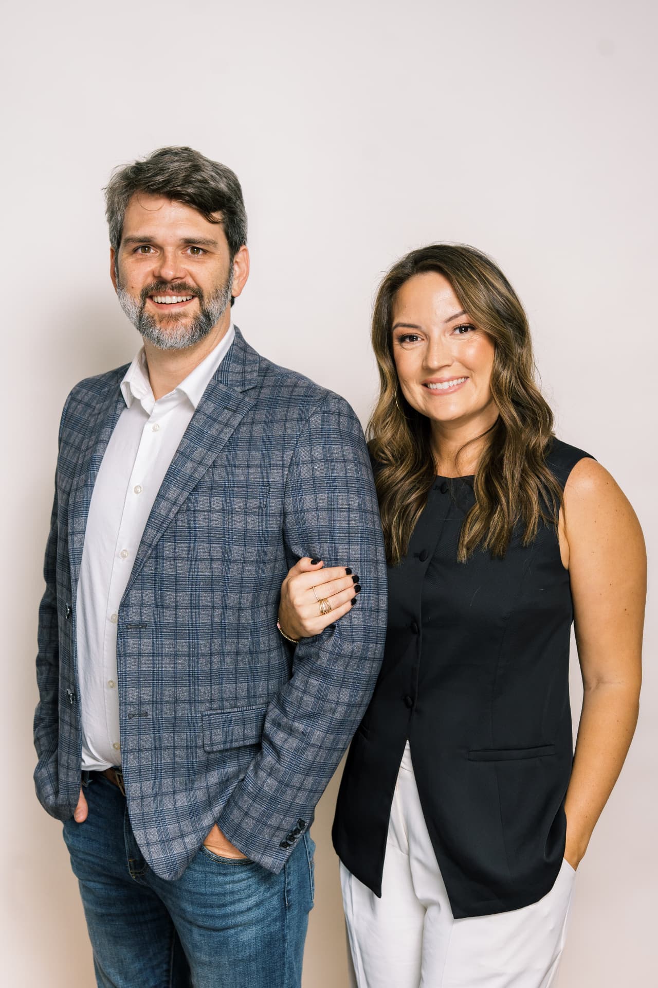 Bailey Jordan and her husband in a professional portrait